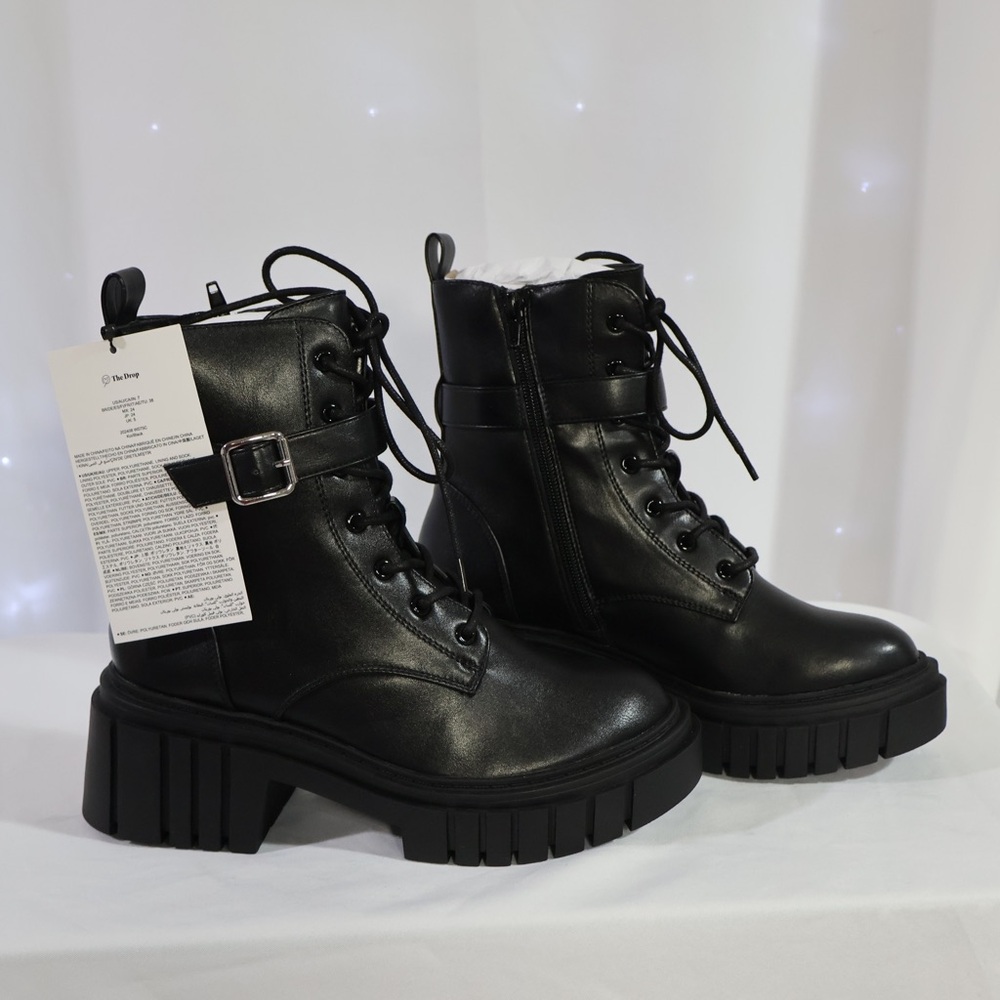 Sleek Black Combat Boots with Buckle Detail